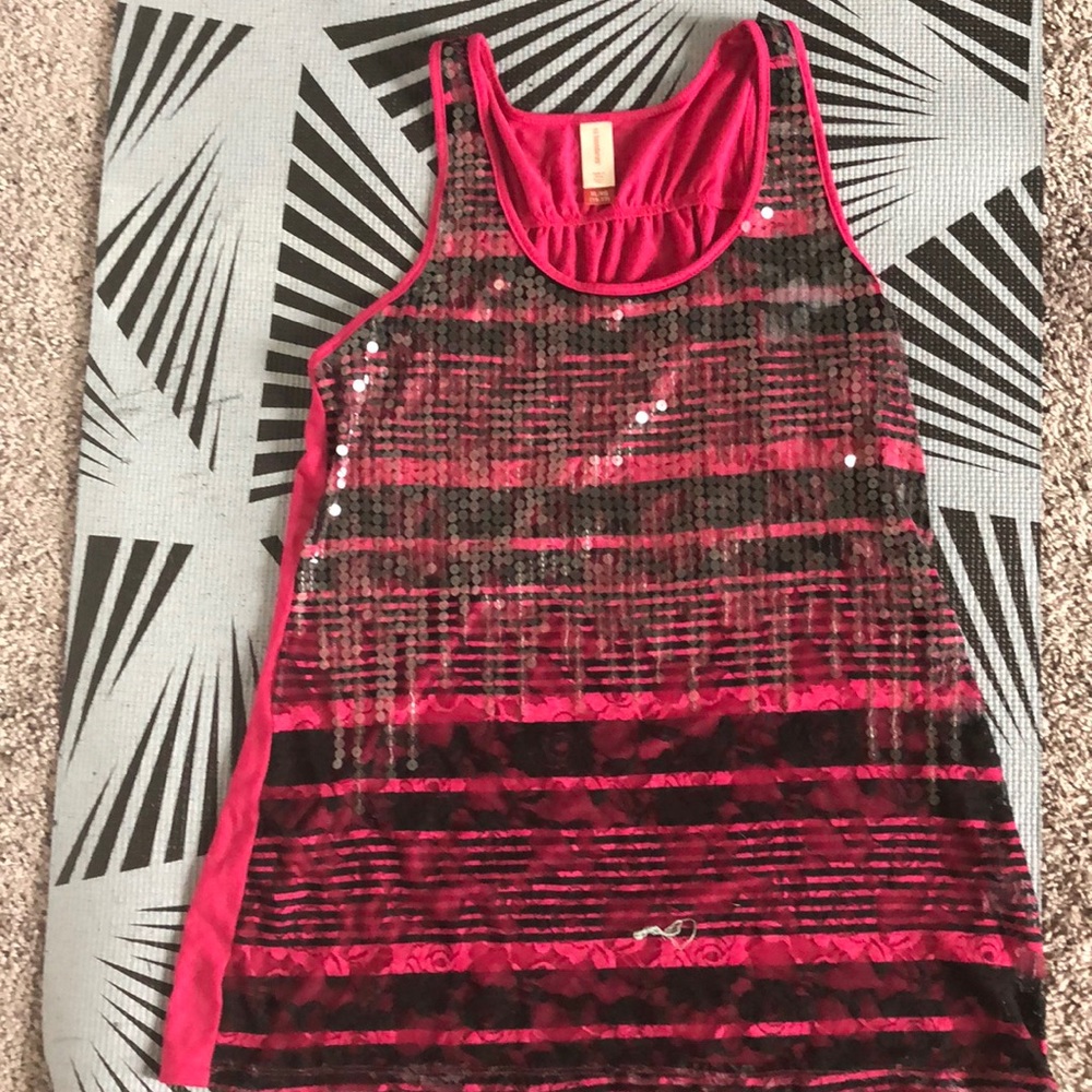 A cute pink, sleeve less top
